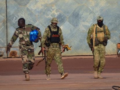 Undated photo provided by the French army showing three Russian mercenaries in northern Mali.