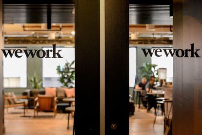 WeWork logos are seen at a WeWork office in San Francisco, California, on September 30, 2019.