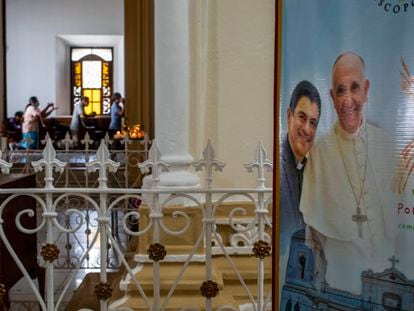 A poster featuring Bishop Rolando Alvarez and Pope Francis hangs inside the Cathedral in Matagalpa, Nicaragua, Aug. 19, 2022.