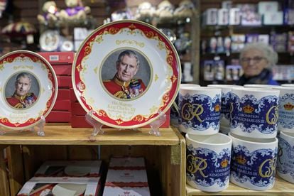 Coronation plates and cups are displayed for sale in a gift shop in London, Monday, April 24, 2023