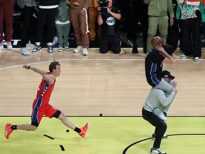Mac McClung of the Philadelphia 76ers shoots during the slam dunk competition of the NBA basketball All-Star weekend Saturday, Feb. 18, 2023, in Salt Lake City. (AP Photo/Rob Gray)