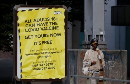A sign encouraging people to get a Covid-19 vaccine in Manchester.