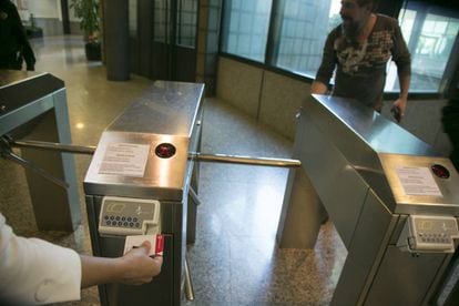 Workers sign in to the offices of public television station Telemadrid.