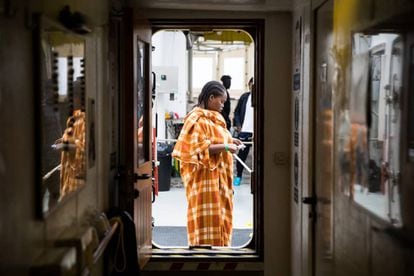 A migrant receives a toothbrush on the ‘Aquarius.’