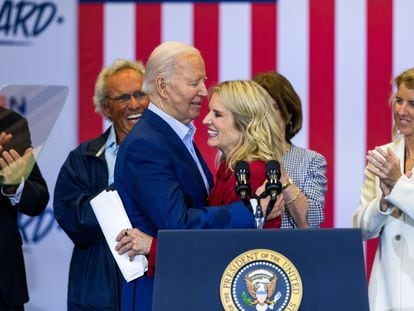 US President Joe Biden (C-L), hugs Kerry Kennedy (C-R) after she and other Kennedy family members endorsed him for president at the Martin Luther King Recreation Center in Philadelphia, April 18, 2024.