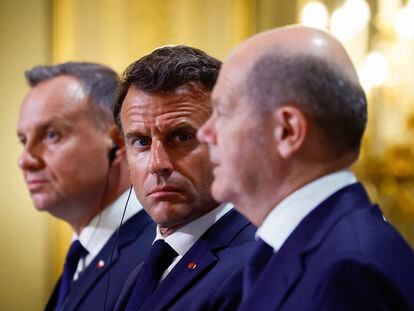 Polish President Andrzej Duda, left, French President Emmanuel Macron, center, and German Chancellor Olaf Scholz attend a joint press conference on June 12, 2023, at the Élysée Palace in Paris.