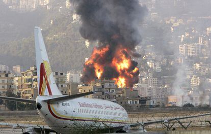 Fire rises from Beirut international airport after it was attacked by an Israeli aircraft on July 14, 2006.