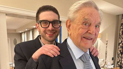 George Soros is seen with his son Alexander, in Munich, Germany in this picture obtained from social media and released February 16, 2023.