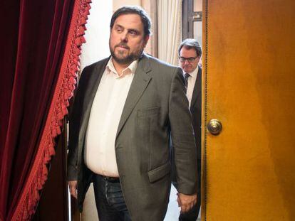 ERC leader Oriol Junqueras (l) wants Artur Mas (r) to call early elections in the coming days or weeks.