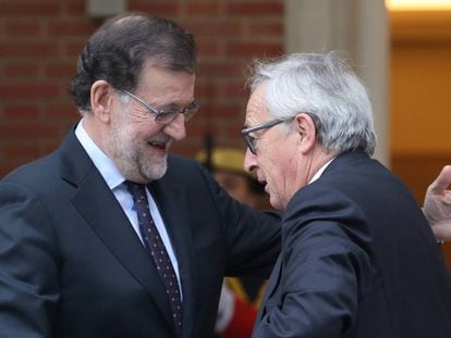 Spanish PM Mariano Rajoy with EU Commission chief Jean-Claude Juncker.