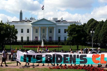 Climate activists rally in front of the White House at Lafayette Square