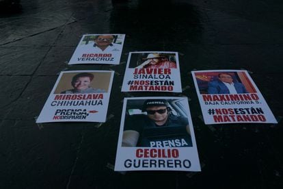 Posters displaying images of reporters who have been killed in Mexico.