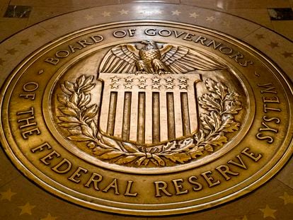 The seal of the Board of Governors of the United States Federal Reserve System is displayed in the ground at the Marriner S. Eccles Federal Reserve Board Building in Washington, Feb. 5, 2018.
