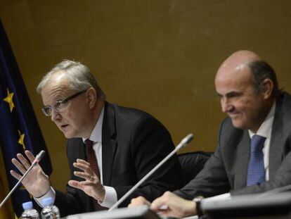 EU economic affairs commissioner Olli Rehn at a news conference in Madrid last month with Spanish Economy Minister Luis de Guindos.