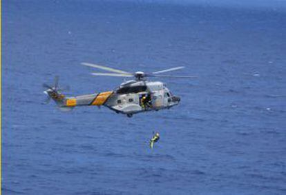 An archive image of a Spanish Maritime Search and Rescue helicopter.