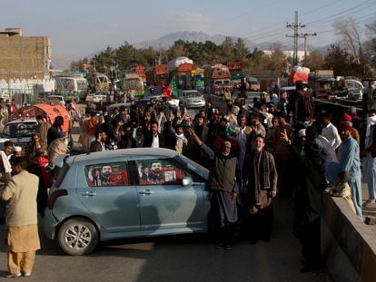 Supporters of Pakistani former Prime Minister Imran Khan's party, the Pakistan Tehreek-e-Insaf (PTI), block a road to protest against the results of the general election, at Baleli, on the outskirts of Quetta, Pakistan, February 12, 2024.