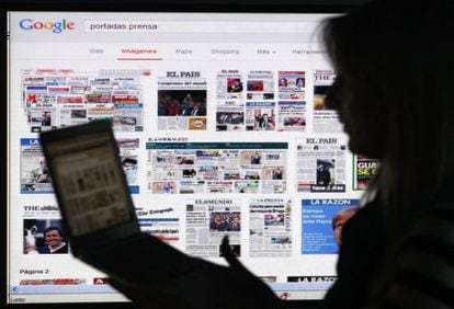 An internet user checks out the front page of a number of newspapers via Google.