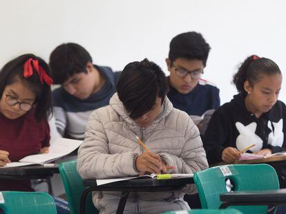 High school graduates take an exam in Mexico City.