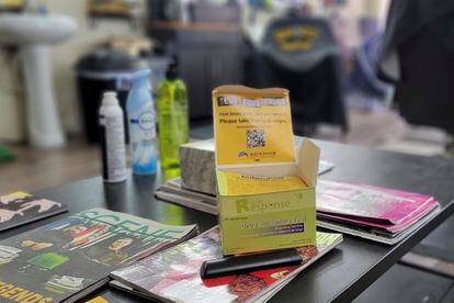 Fentanyl test strips sit atop magazines in the waiting area of Urban Kutz Barbershop in Cleveland