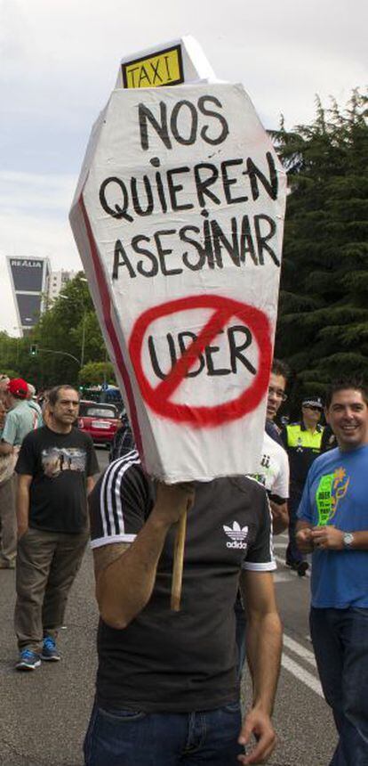 Taxi drivers protest against Uber in June 2014. “They want to murder us,” reads the message.