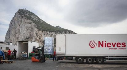 Spanish workers drop off goods near Gibraltar airport.
