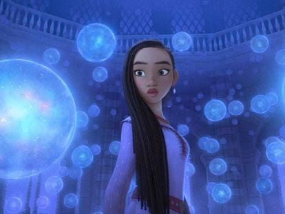 This image released by Disney shows Asha, voiced by Ariana DeBose, in a scene from the animated film "Wish."