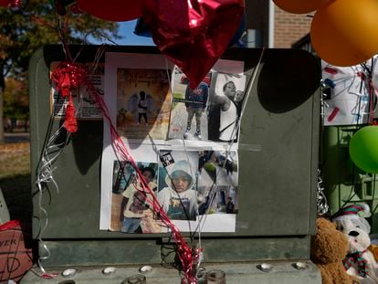 Images of Dominic Davis, an 11-year-old boy who was killed in a weekend shooting, are part of a makeshift memorial, Monday, Nov 6, 2023, in Cincinnati.