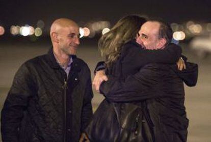 Marc Marginedas (right) is welcomed home by his family Barcelona.