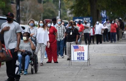 Long lines of early voters in Augusta, Georgia wait to cast ballots in the 2020 elections.