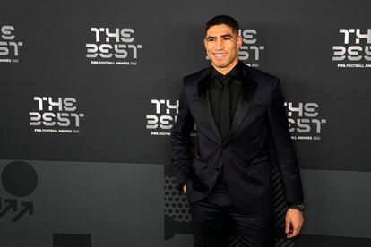 Moroccan player Achraf Hakimi poses on the green carpet before the ceremony of the Best FIFA Football Awards in Paris, France, Monday, Feb. 27, 2023.