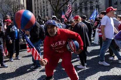 A Trump supporter spinning basketballs at protest held in Collect Pond Park across the street from the Manhattan District Attorney's office in New York on Tuesday, April 4, 2023