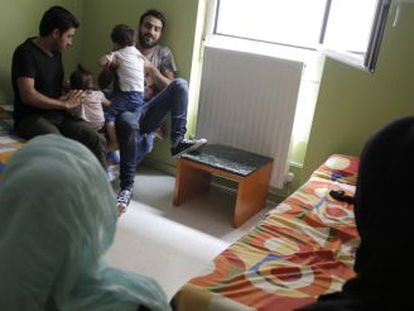 Syrian refugees staying at a Madrid hotel, but hoping to move on to Germany.
