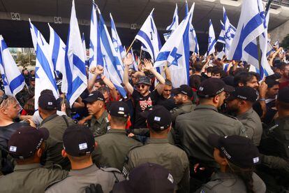 Police surround demonstrators during the "Day of Shutdown" protest in Tel Aviv, Israel, on March 23, 2023.