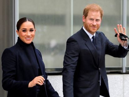Britain's Prince Harry and Meghan, Duke and Duchess of Sussex, wave as they visit One World Trade Center in Manhattan, New York City, on September 23, 2021.
