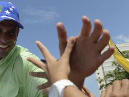 Henrique Capriles greets supporters in La Guaira, Vargas state on Monday. 