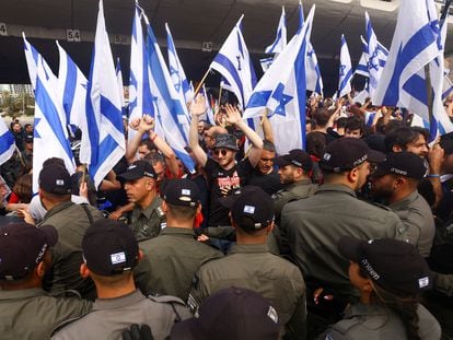 Police surround demonstrators during the "Day of Shutdown" protest in Tel Aviv, Israel, on March 23, 2023.