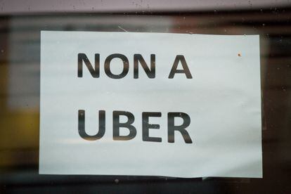 "No to Uber" reads a sign on the window of a taxi during a protest in which one thousand taxi drivers blocked traffic in Brussels against the reforms in the transportations sector, in 2015.