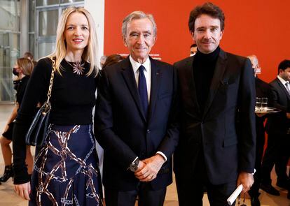 Bernard Arnault with two of his five children – Delphine and Antoine – during an event in Paris, circa 2021.