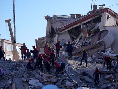 Rescuers search in a destroyed building in Gaziantep, southeastern Turkey, Thursday, Feb. 9, 2023.