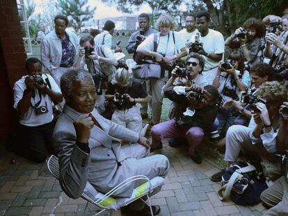 Nelson Mandela poses for the press after his release in 1990, following 27 years of imprisonment.