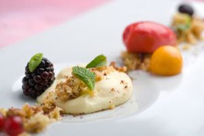 Cheese mousse, crumble of fresh herbs and red fruits at Dabbawala.