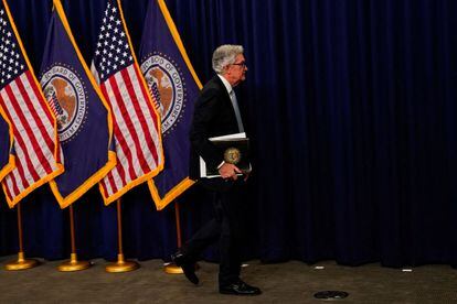 Federal Reserve Board Chairman Jerome Powell leaves a news conference after Powell, following the Federal Open Market Committee meeting on interest rate policy in Washington.