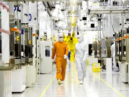 Semiconductor manufacturing takes place in highly robotized, isolated and sterilized plants, where a handful of engineers walk around dressed as though expecting biological warfare.