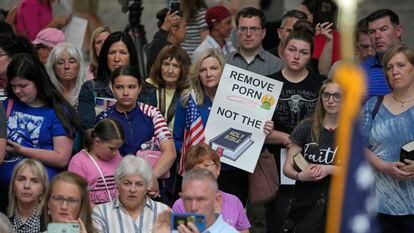 People gather during a rally at the Utah State Capitol, in Salt Lake City