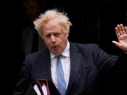 British Prime Minister Boris Johnson leaves 10 Downing Street to attend the weekly Prime Minister's Questions at the Houses of Parliament, in London, on May 25, 2022.