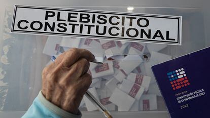 A person votes in the September 2022 referendum in Santiago, Chile.