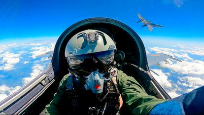 In this photo released by Xinhua News Agency, a Chinese fighter jet pilot from the Chinese People's Liberation Army takes part in combat readiness patrol and military exercises around Taiwan on April 9, 2023.