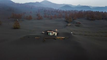 A house covered in ash, photographed by a drone on November 1.