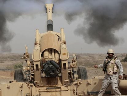 Saudi soldiers fire artillery at the Saudi border with Yemen in this file photo from April 2015.