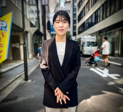 Akiho Kobokayama, on a street in the Ginza neighborhood of Tokyo, adjacent to the headquarters of the company where she works.